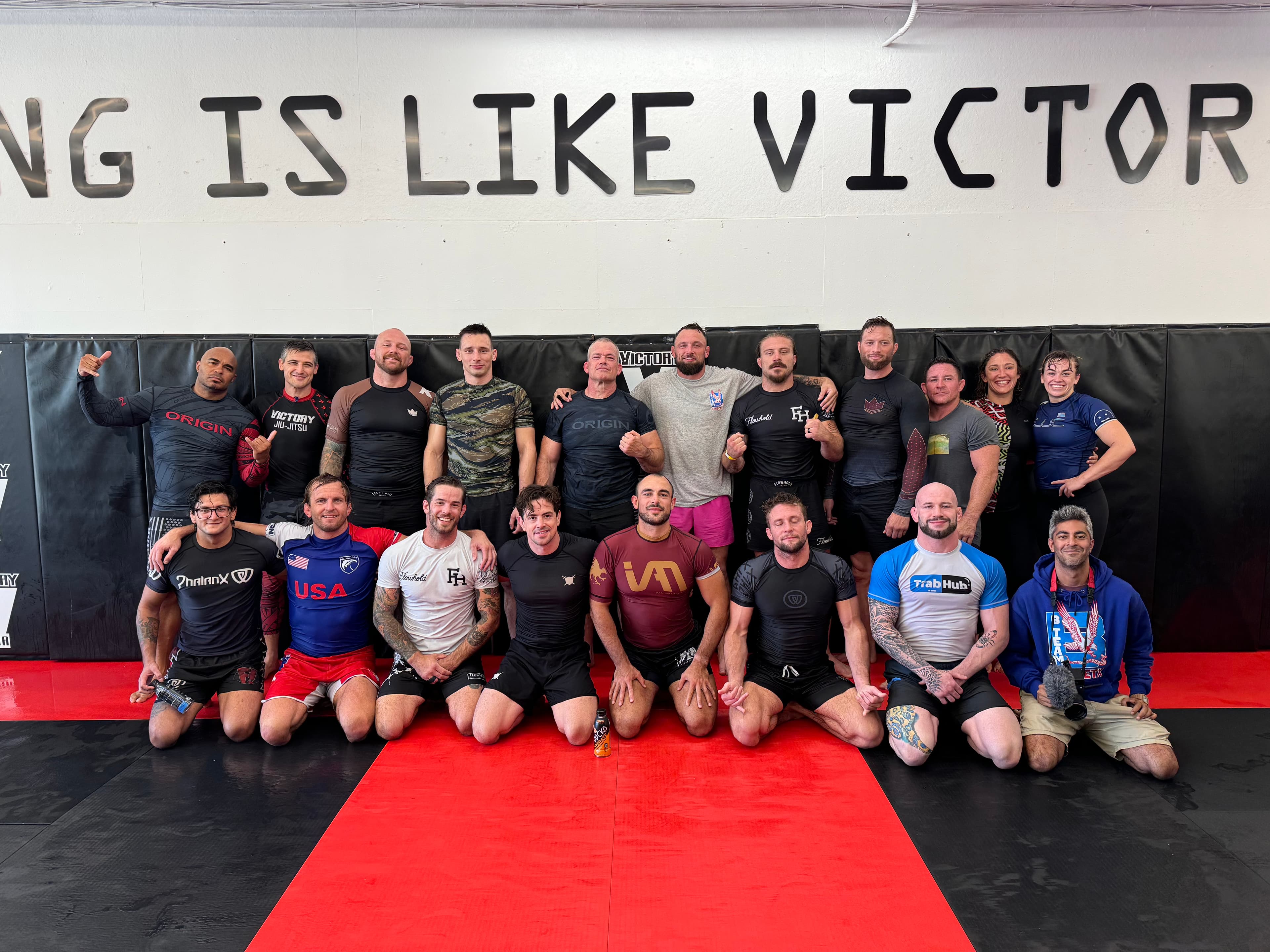 Victory team group photo in the academy